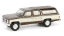 Изображение GREENLIGHT 1/64  GMC Suburban 1986 indian bronze/doeskin tan